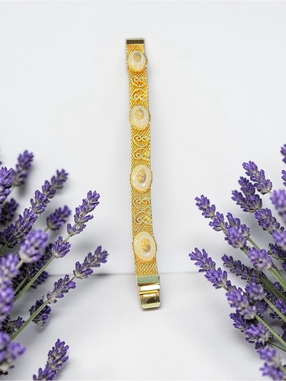 Gold Tone Mesh Bracelet With Gray Cabochon Heart Shape Filigree